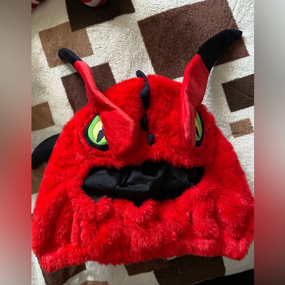 Red Furry motocyclist Monster helmet cover.